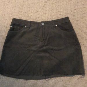 Green corduroy skirt with raw hem line